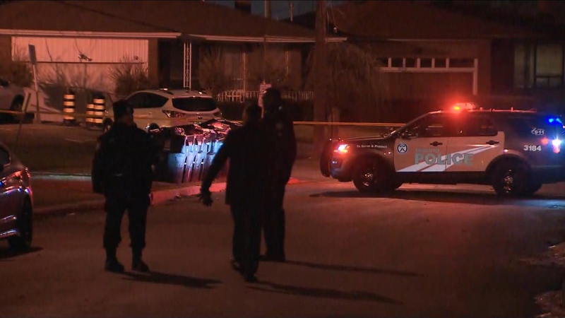 Police investigate after a body was discovered on Romfield Drive in North York Tuesday December 24, 2019. 