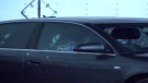 Bullet holes are seen in a black Audi sedan after a shooting in Mississauga on Dec. 25, 2019. (CP24)