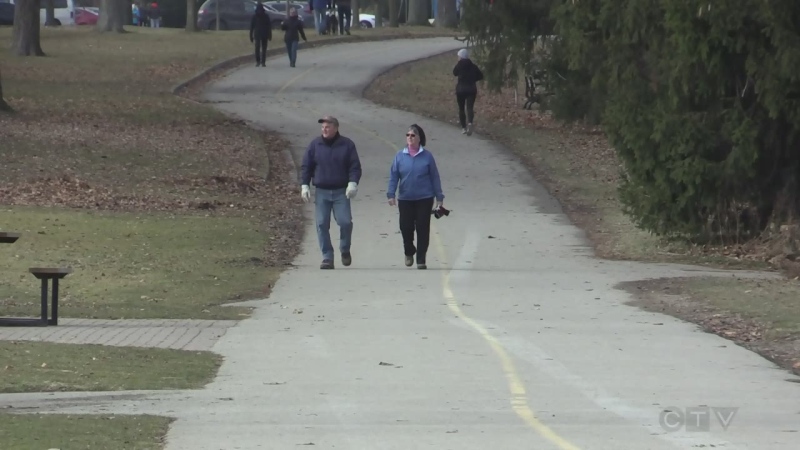 Runners and walkers enjoy the warm weather in Springbank Park in London, Ont. on Saturday, Dec. 28, 2019.
(Brent Lale / CTV London) 