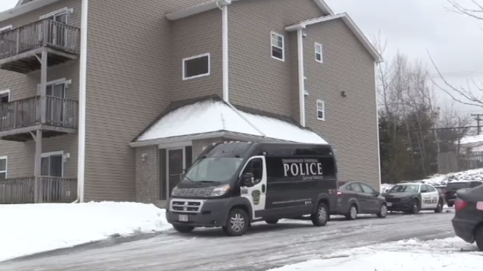 Police respond to an apartment building in Rothesay, N.B. where the bodies of a 43-year-old woman and a 7-year-old girl were found inside a unit.