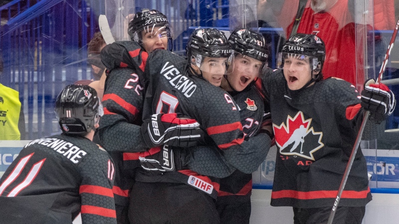 Canada's Dylan Cozens (22, back left) celebrates with teammates (left to right) Alexis Lafreniere, Joe Veleno, Barrett Hayton and Calen Addison after scoring the first goal against Russia during second period action in the gold medal game at the World Junior Hockey Championships, Sunday, January 5, 2020 in Ostrava, Czech Republic. THE CANADIAN PRESS/Ryan Remiorz