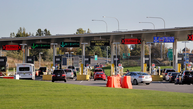 In this photo taken Oct. 9, 2019, traffic enters the United States from Canada at the Peace Arch Border Crossing, in Blaine, Wash. (AP / Elaine Thompson)