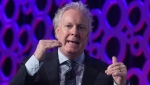 Jean Charest speaks during a panel discussion at the Canadian Aerospace Summit in Ottawa, Wednesday, Nov. 13, 2019. (THE CANADIAN PRESS / Adrian Wyld)