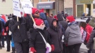 Teachers and support staff with the Avon Maitland District School Board march as part of a one-day strike in Blyth, Ont. on Wednesday, Jan. 8, 2020. (Scott Miller / CTV London)