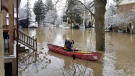 A resident canoes along a flooded New Hamburg street after a weather event. (Photo: Deb McCue Wideman) (Jan. 12, 2020)