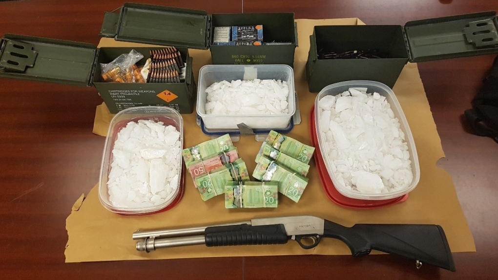 Shotgun, drugs and cash seized