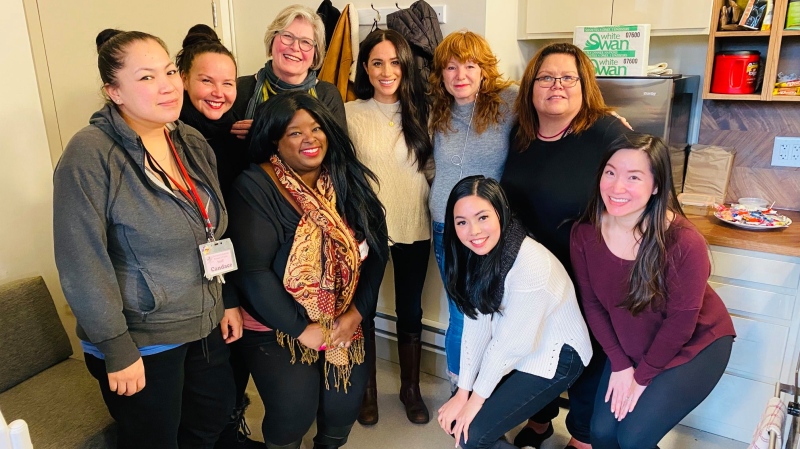 Meghan Markle, centre, poses with a group at the Downtown Eastside Women's Centre on Tuesday, Jan. 14, 2019. (Facebook/Downtown Eastside Women's Centre) 