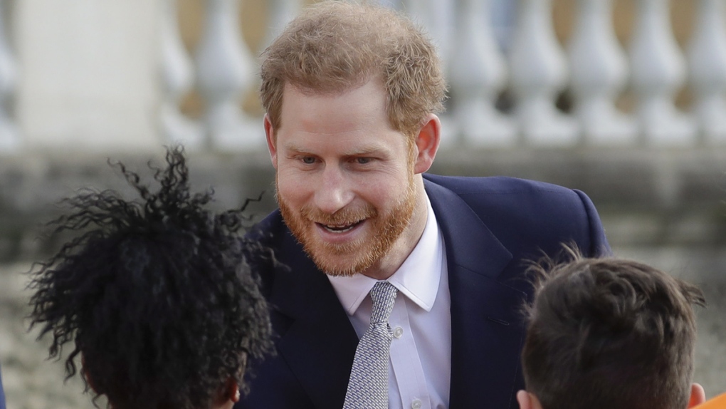 Prince Harry in the gardens of Buckingham Palace