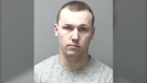 Ryan Michael Tubrett is facing charges of attempted murder, using a firearm in the commission of an offence, possession of a weapon for a dangerous purpose, dangerous operation of a motor vehicle, and two breaches of probation. (Cape Breton Regional Police)