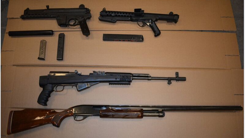 Guns including a 9mm Sterling Submachine gun (top right) are shown in Toronto police handout image. (TPS)