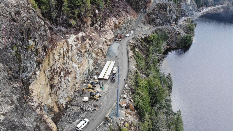 Construction crews were able to install a new bridge at the site of a landslide on Highway 4 on Vancouver Island more quickly than anticipated Saturday night. (@DriveBC/Twitter)