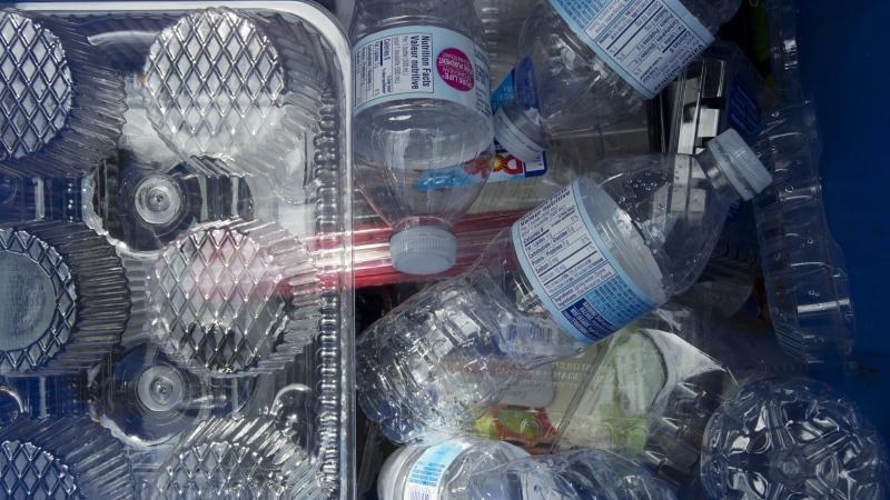 Plastics are seen being gathered for recycling at a depot in North Vancouver on June, 10, 2019. Environment Canada is releasing scientific evidence today to back up the government's bid to ban most single-use plastics next year. Prime Minister Justin Trudeau announced last June the government was getting ready to prohibit the production and sale of single-use plastics in Canada, such as drinking straws, takeout containers and plastic cutlery. THE CANADIAN PRESS/Jonathan Hayward