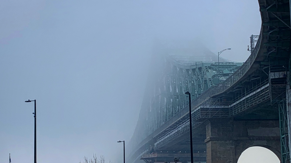 Fog shrouds Jacques Cartier Bridge