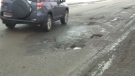This pothole-littered road in Reserve Mines, N.S. is the talk of the town, and one councillor is calling on the province to repave it.