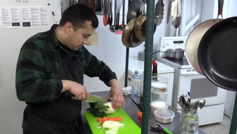 Co-owner of Petojo Food and Rasa Indonesia, Anthony Abdullah, prepares a meal.
(Celine Zadorsky / CTV London) 