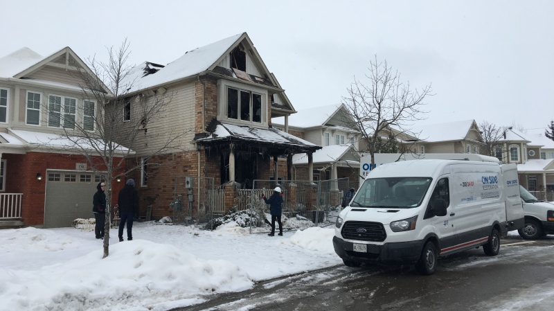 Restoration workers arrive at a Holland Circle home that was the scene of a fire. (Feb. 7, 2020)