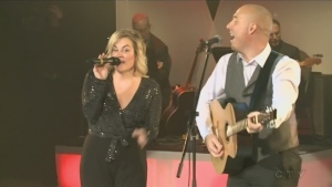 Marc Serre and Celine Tellier sing