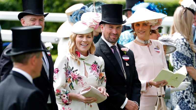 In this Thursday June 20, 2019 file photo, Peter Phillips and Autumn Phillips attends the third day of the annual Royal Ascot horse race meeting, which is traditionally known as Ladies Day, in Ascot, England. (AP Photo/Alastair Grant, File)