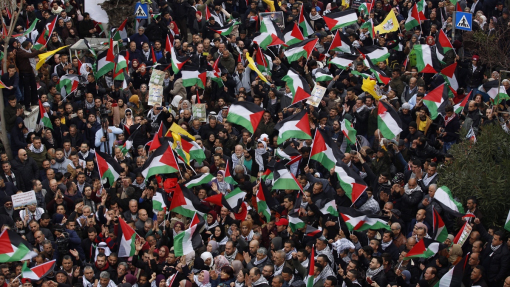 Palestinians rally in Ramallah