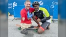 Chris Koch with Akhil, who returned his shoe, after finishing the Dubai Marathon. (Courtesy Chris Koch)