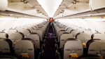 An undated file photo showing empty seats on an airplane. (Kelly Lacy / Pexels)