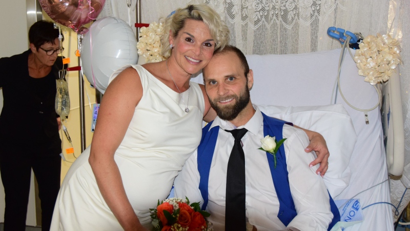 Melissa Oitzl and Brock Thom exchanged wedding vows while Thom awaited a high-risk, life-saving surgery at the Ottawa Heart Institute.