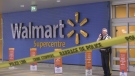 A police officer is seen outside a Walmart in Richmond, B.C. during a standoff on Feb. 18, 2020. 