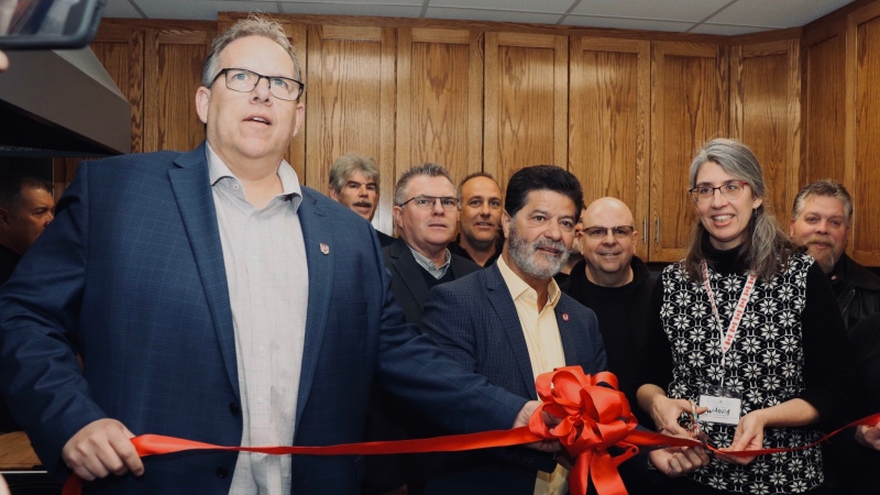 Unifor Local 444 president Dave Cassidy and Unifor national president Jerry Dias attend the official ribbon cutting at Chatham Hope Haven in Chathem, Ont., on Friday, Feb. 21, 2020. (Unifor Local 444/ Twitter)