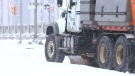 A city plow clears snow in downtown Ottawa during a storm. (File photo)