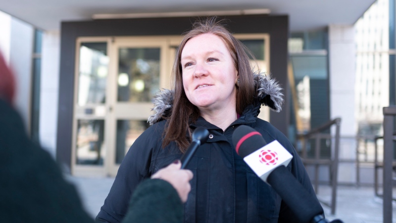 Emily Eaton, a professor in the department of geography and environmental science at the University of Regina, speaks to reporters at the Court of Queen's Bench in Regina on Wednesday Feb. 26, 2020.THE CANADIAN PRESS/Michael Bell