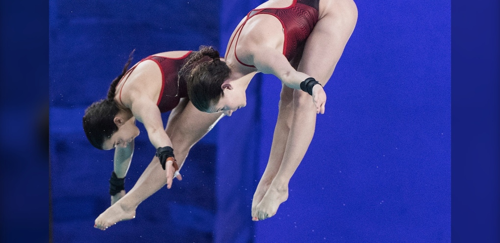 Meaghan Benfeito, left, and Caeli McKay of Canada