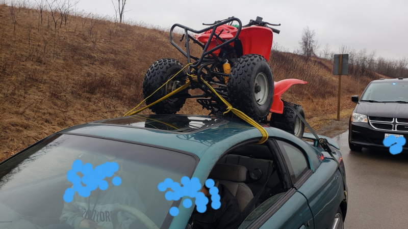On Tuesday, OPP tweeted pictures of a car with an ATV strapped to the roof.