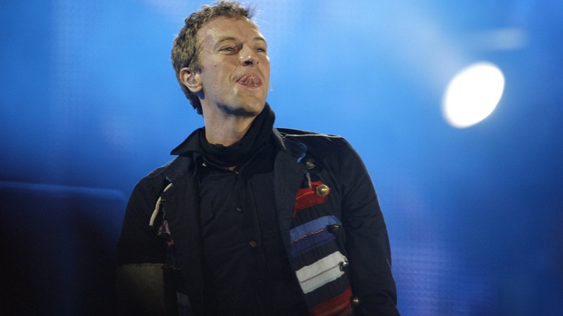 Chris Martin, of Coldplay, performs at Wembley Stadium in London, Friday, Sept. 18, 2009. (AP / Joel Ryan)