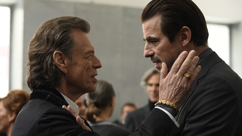 Mick Jagger, left, and Claes Bang in a scene from the film, 'The Burnt Orange Heresy.' (Jose Haro / Sony Pictures Classics via AP)