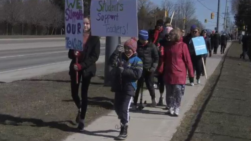 Students join the march as teachers with the Ontario English Catholic Teachers' Association take to the picket line in London, Ont. on Thursday, March 5, 2020. (Sean Irvine / CTV London)