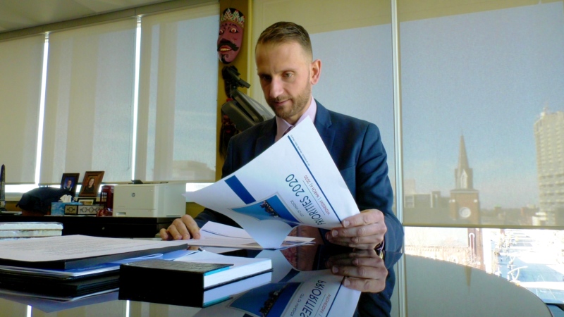 Andrew Teliszewsky, Windsor Mayor Drew Dilkens' Chief of Staff, reads over a priorities document in the Mayor's office on March 5, 2020. (Rich Garton / CTV Windsor)