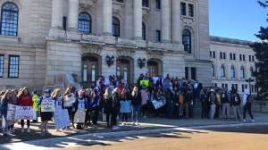 Students rally in front of the Saskatchewan Legislative Building in response to cancellations of extracurricular activities in their schools. (Claire Hanna/CTV News) 