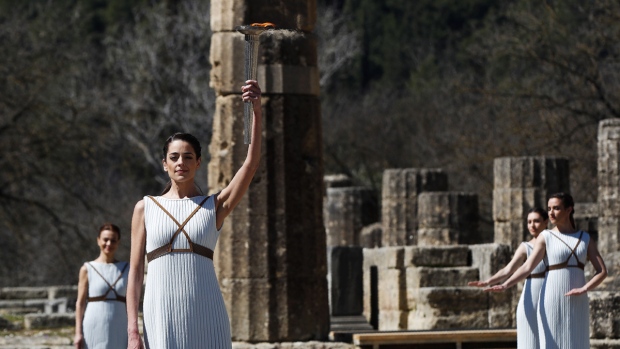 Amid virus precautions, Tokyo Olympic flame is lit in Greece | CTV News