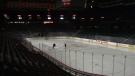 Two members of the Calgary Flames on the ice of the Scotiabank Saddledome on March 12 prior to the announcement of the suspension of the 2019-2020 NHL season 