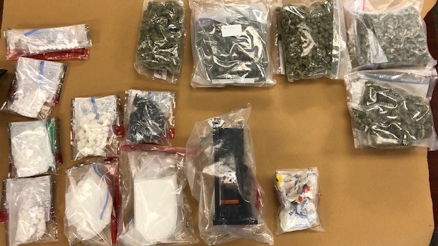 Drugs and weapons seized in London, Ont. on Wednesday, March 11, 2020 are seen in this image released by the London Police Service.