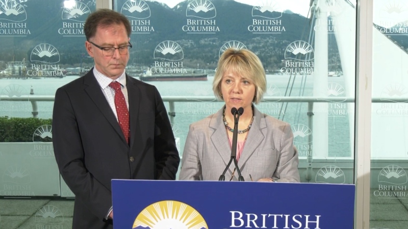Provincial health officer Dr. Bonnie Henry, right, and B.C. Health Minister Adrian Dix announce 11 new cases of the COVID-19 virus on Friday, March 13, 2020. 