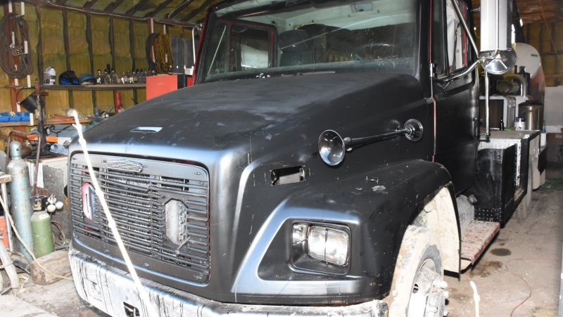 A stolen fire truck in the process of being repainted is seen in this image released Monday, March 16, 2020 by the Strathroy-Caradoc Police Service.