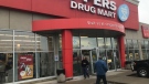 People come and go from the Adelaide Street and Southdale Road Shoppers Drug Mart in London, Ont. on Tuesday, March 17, 2020. (Sean Irvine / CTV London)