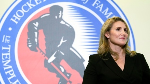 In this Nov. 15, 2019, file photo, Hockey Hall of Fame inductee Hayley Wickenheiser poses in Toronto. (Nathan Denette/The Canadian Press via AP, Fle)