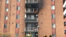 Firefighters respond to a fire at an apartment in Windsor, Ont. on Wednesday, March 18, 2020. (Rob Hindi / AM800)