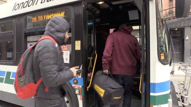 Passengers board a London Transit Commission bus in London, Ont. on Wednesday, March 18, 2020. (Marek Sutherland / CTV London)