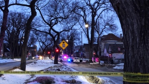 Police on scene of Burrows Avenue on March 19, 2020. (Source: Alex Brown/CTV News Winnipeg)