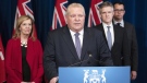 Ontario Premier Doug Ford answers questions as (left to right) Minister of Health Christine Elliott, Finance Minister Rod Philips and Minister of Labour, Training and Skills Monte McNaughton listen in during a news conference at the Ontario Legislature in Toronto on Thursday, March 19, 2020. (THE CANADIAN PRESS/Frank Gunn)