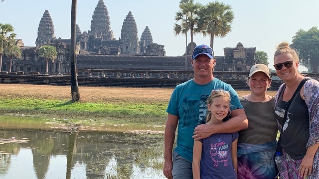 Dwight and Amy Irwin and their daughters are seen in Angor Wat, Cambodia in this undated family photo. (Source: Amy Irwin)