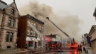 Crews battle a major fire in downtown Woodstock, Ont. on Wednesday, March 18, 2020. (Taylor Choma / CTV London)